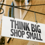 thinking big shop small sign